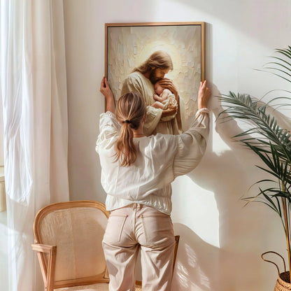 Jesús sostiene a bebé